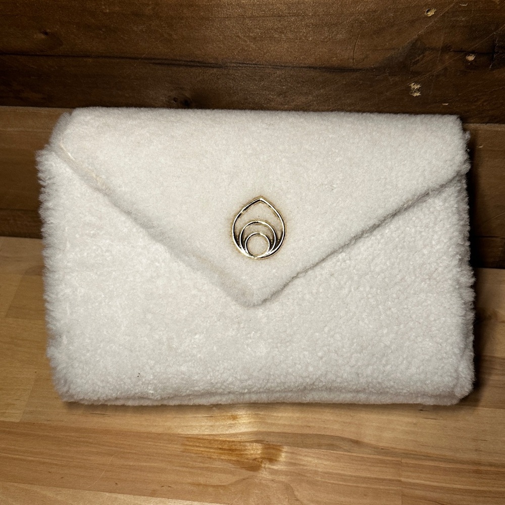 LOVE LETTER SHEARLING ENVELOPE CLUTCH IN IVORY